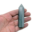 Terahertz Obelisk Tower Crystal by GemstoneGO, showcasing a sleek, polished gemstone obelisk with intricate natural patterns.