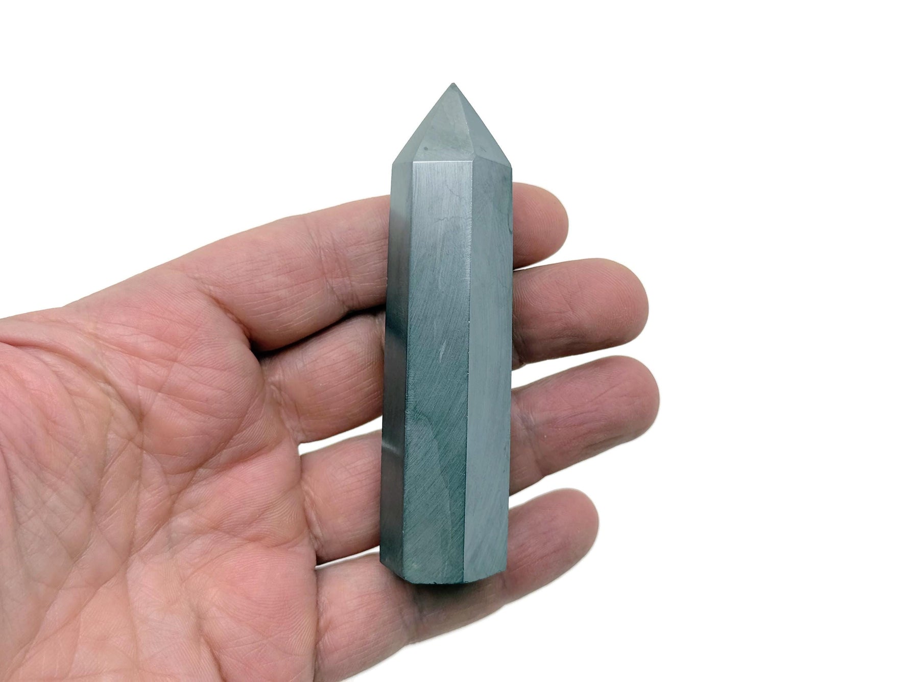 Terahertz Obelisk Tower Crystal by GemstoneGO, showcasing a sleek, polished gemstone obelisk with intricate natural patterns.