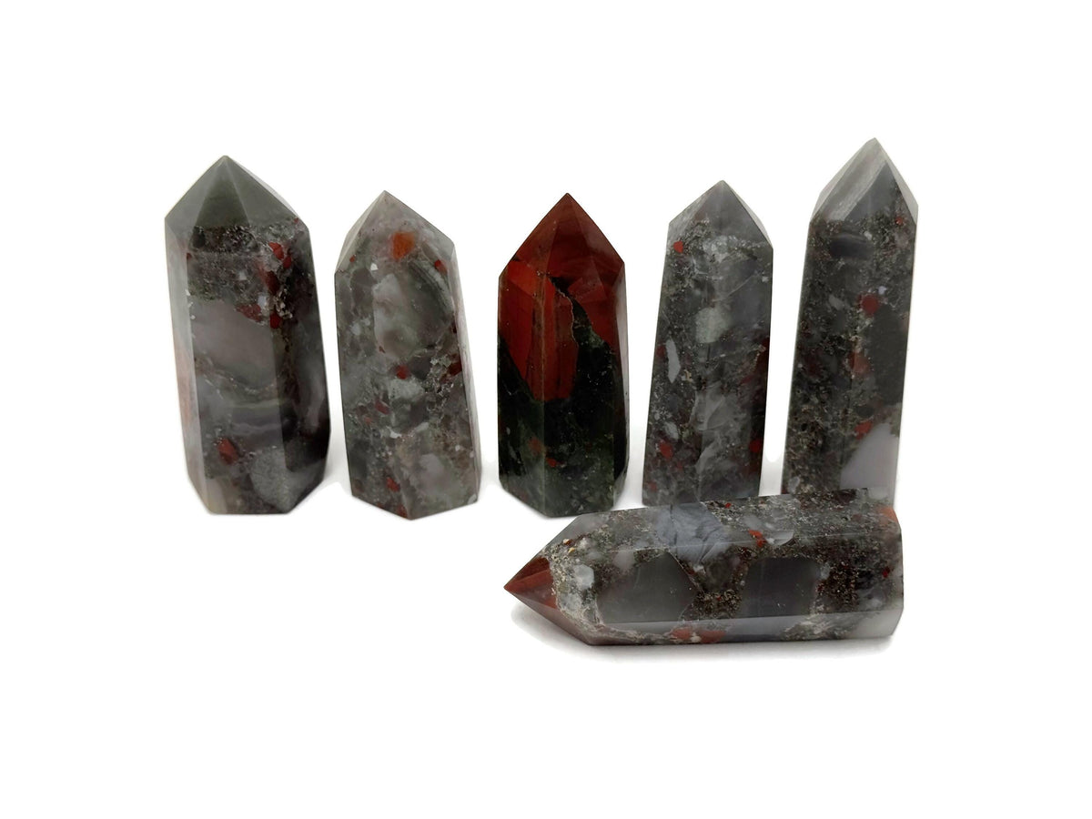 African Bloodstone obelisk tower crystal from GemstoneGO, showcasing a dark green stone with reddish bloodstone inclusions.