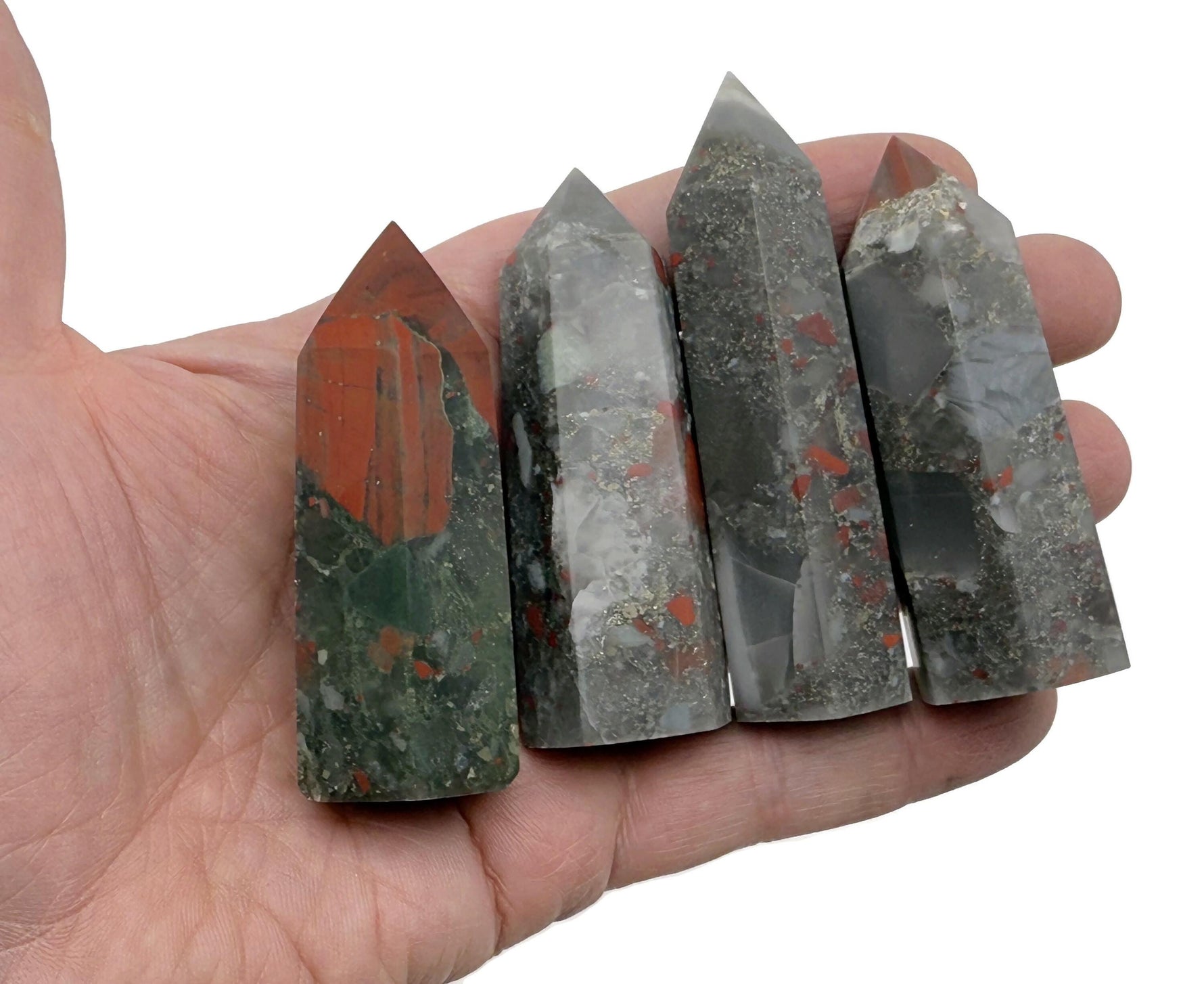 African Bloodstone obelisk tower crystal from GemstoneGO, featuring a dark green stone with red bloodstone inclusions.