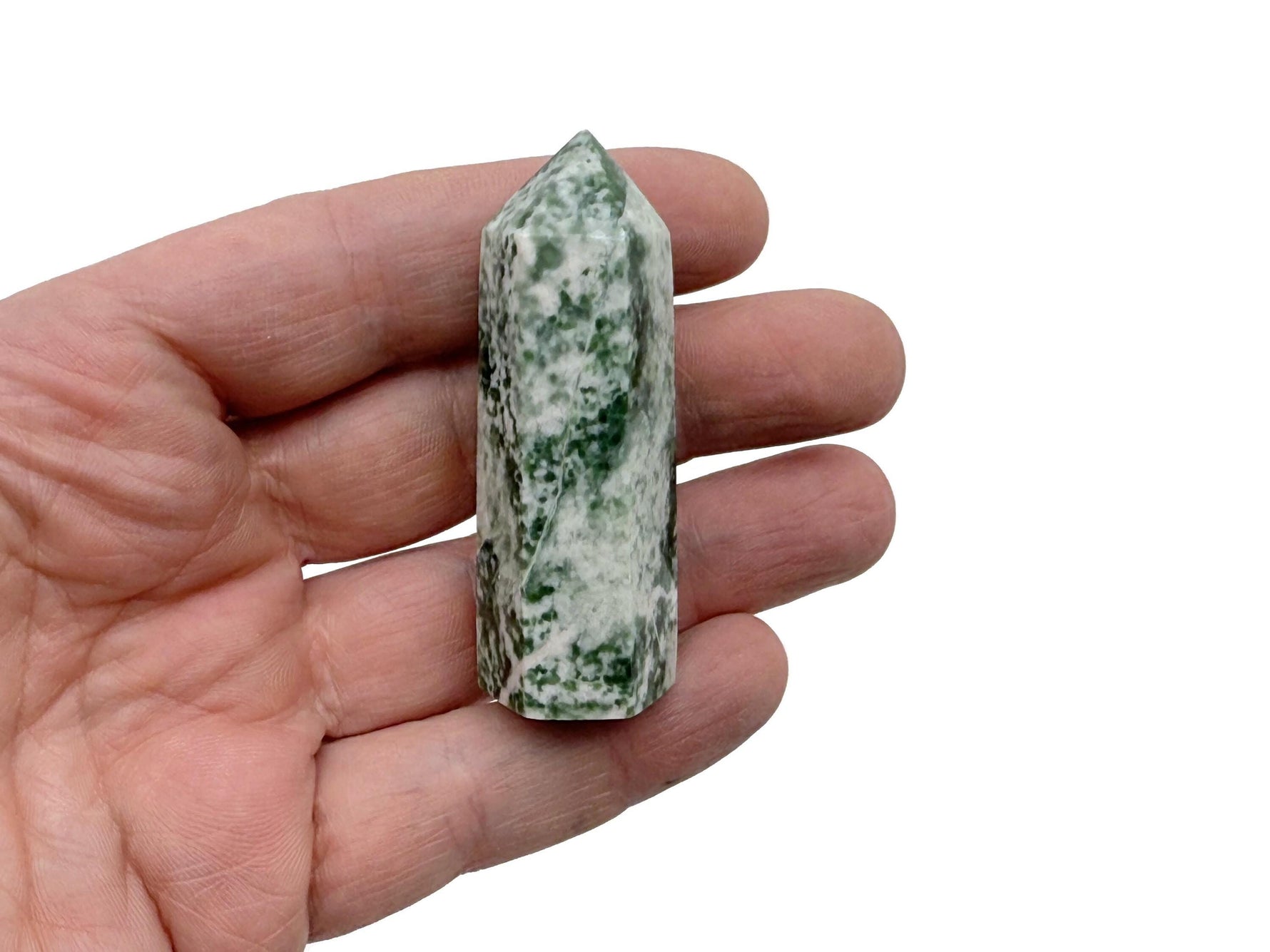Green Jade Obelisk Tower made of Qinghai Jade gemstone, showcasing a polished green crystal with natural stone patterns.