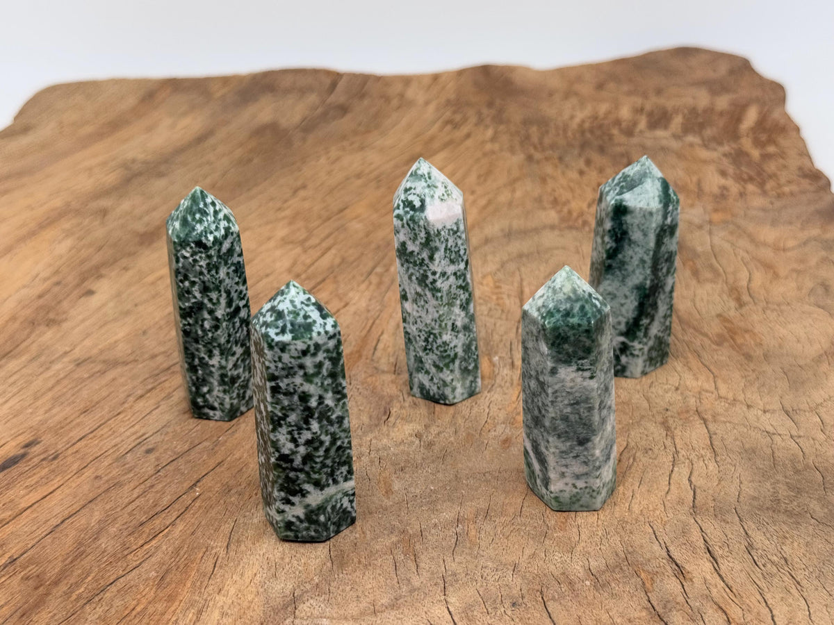 Green Jade Obelisk Tower made of Qinghai jade gemstone, featuring a polished, vibrant green crystal with natural stone patterns.