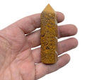 Calligraphy Jasper obelisk tower crystal from GemstoneGO, showcasing rich brown and red patterns in a tall, polished gemstone sculpture.