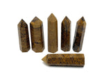 Calligraphy Jasper obelisk tower crystal from GemstoneGO, showcasing a polished, natural stone with rich earthy tones and intricate patterns.
