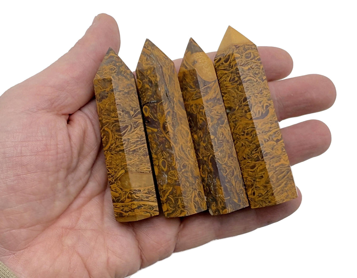 Calligraphy Jasper obelisk tower crystal from GemstoneGO, showcasing earthy tones and polished gemstone details.