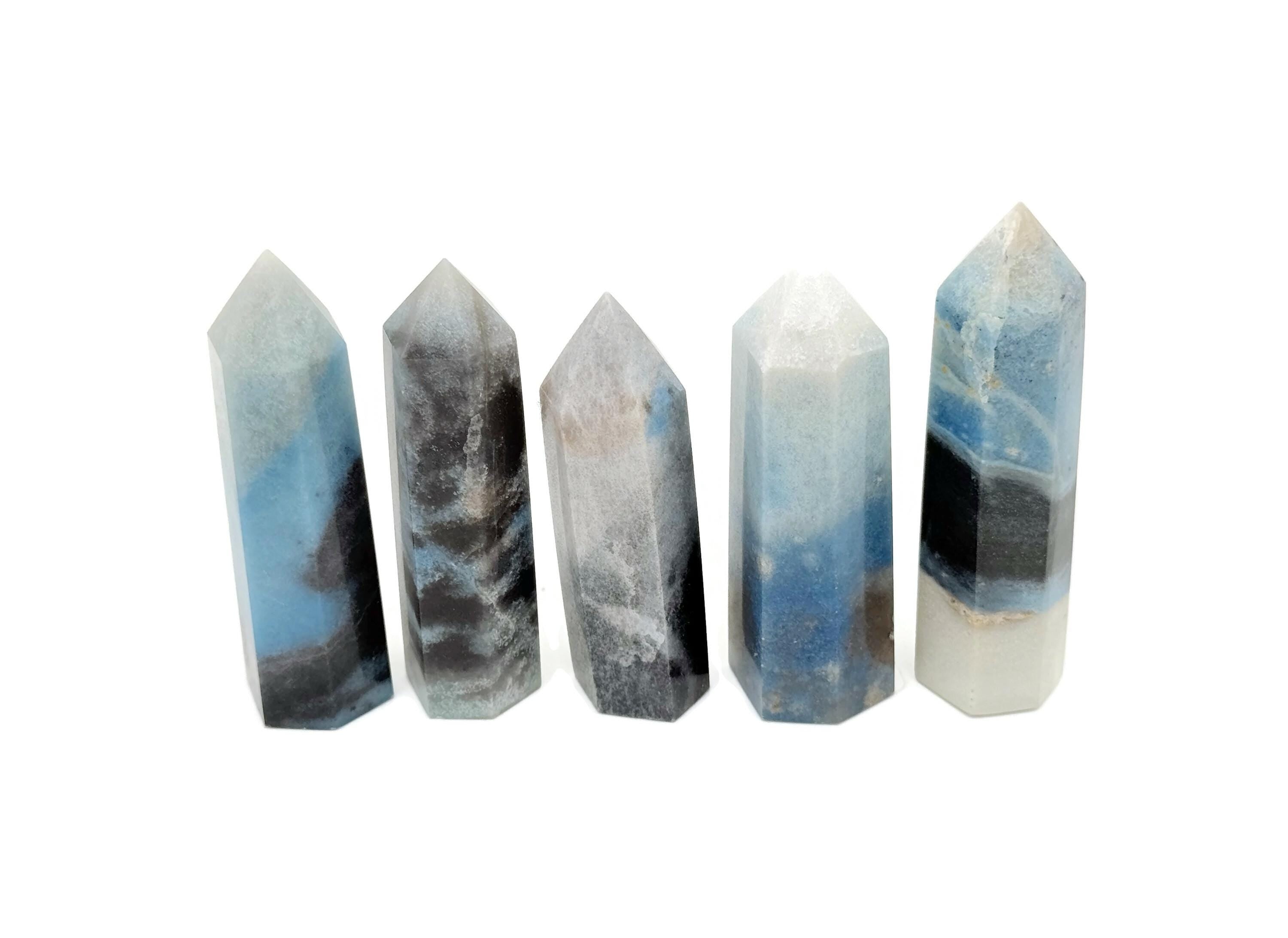 Trolleite obelisk tower crystal from GemstoneGO, showcasing a blue-green mineral gemstone with natural crystal formations.