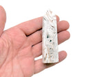 Mexican White Agate obelisk tower crystal from GemstoneGO, showcasing smooth, polished white and beige stone with natural banding.