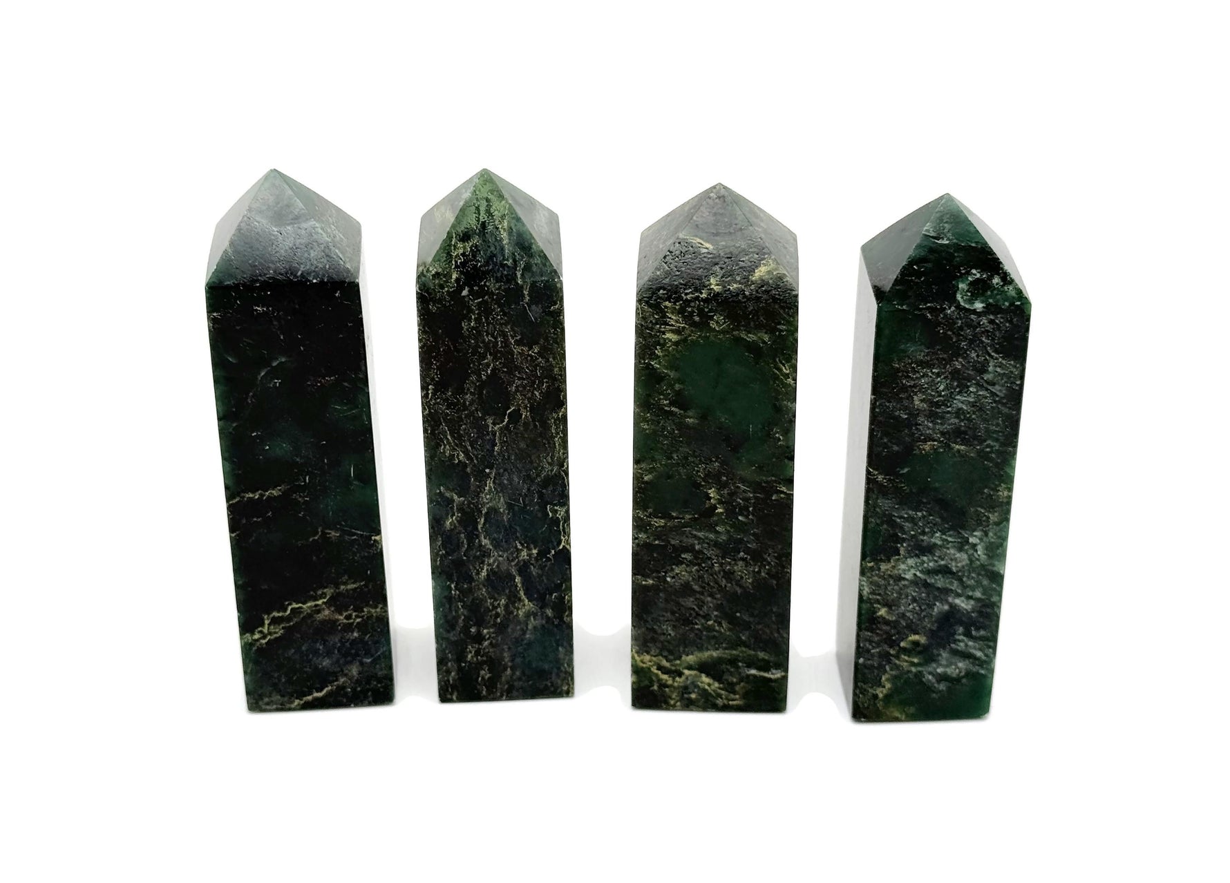 Emerald quartz obelisk tower crystal from GemstoneGO, showcasing a polished green gemstone with natural crystal formations.