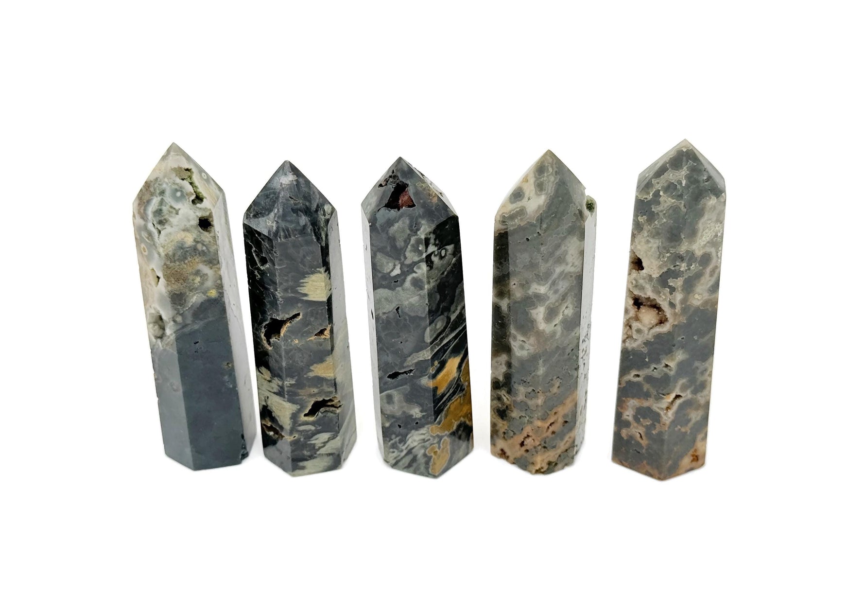 Ocean Jasper obelisk tower crystal by GemstoneGO, showcasing colorful, polished gemstone with natural patterns and smooth pointed top.