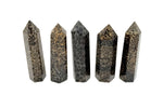 Leopard Skin Jasper obelisk tower crystal by GemstoneGO, featuring warm spotted stone with pointed tip and smooth polished surface.