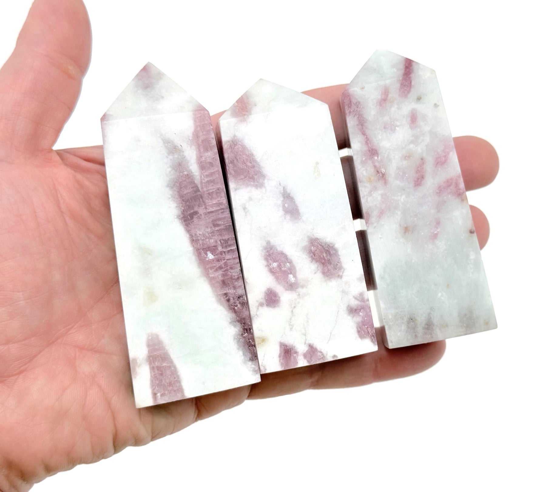 Pink tourmaline obelisk tower crystal from GemstoneGO, showcasing a polished pink gemstone obelisk with natural crystal details.