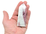 Pink tourmaline obelisk tower crystal from GemstoneGO, showcasing a polished pink gemstone with a pointed obelisk shape.