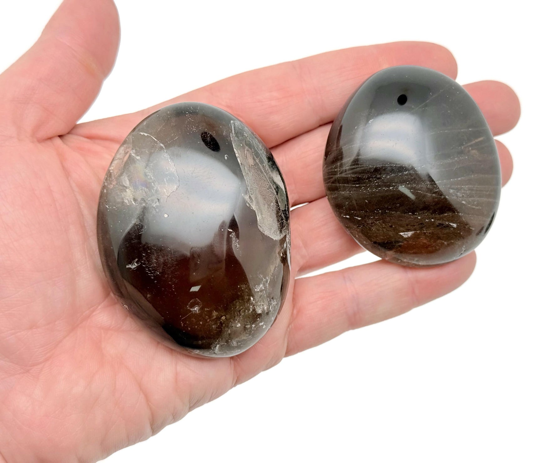 Smoky Quartz palm gemstone spa stone from GemstoneGO, showing a polished, natural brownish-gray gemstone with smooth surface.