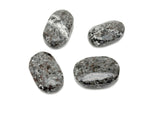 Yooperlite palm gemstone with fluorescent sodalite spa stone, featuring vibrant blue and orange hues, from GemstoneGO.