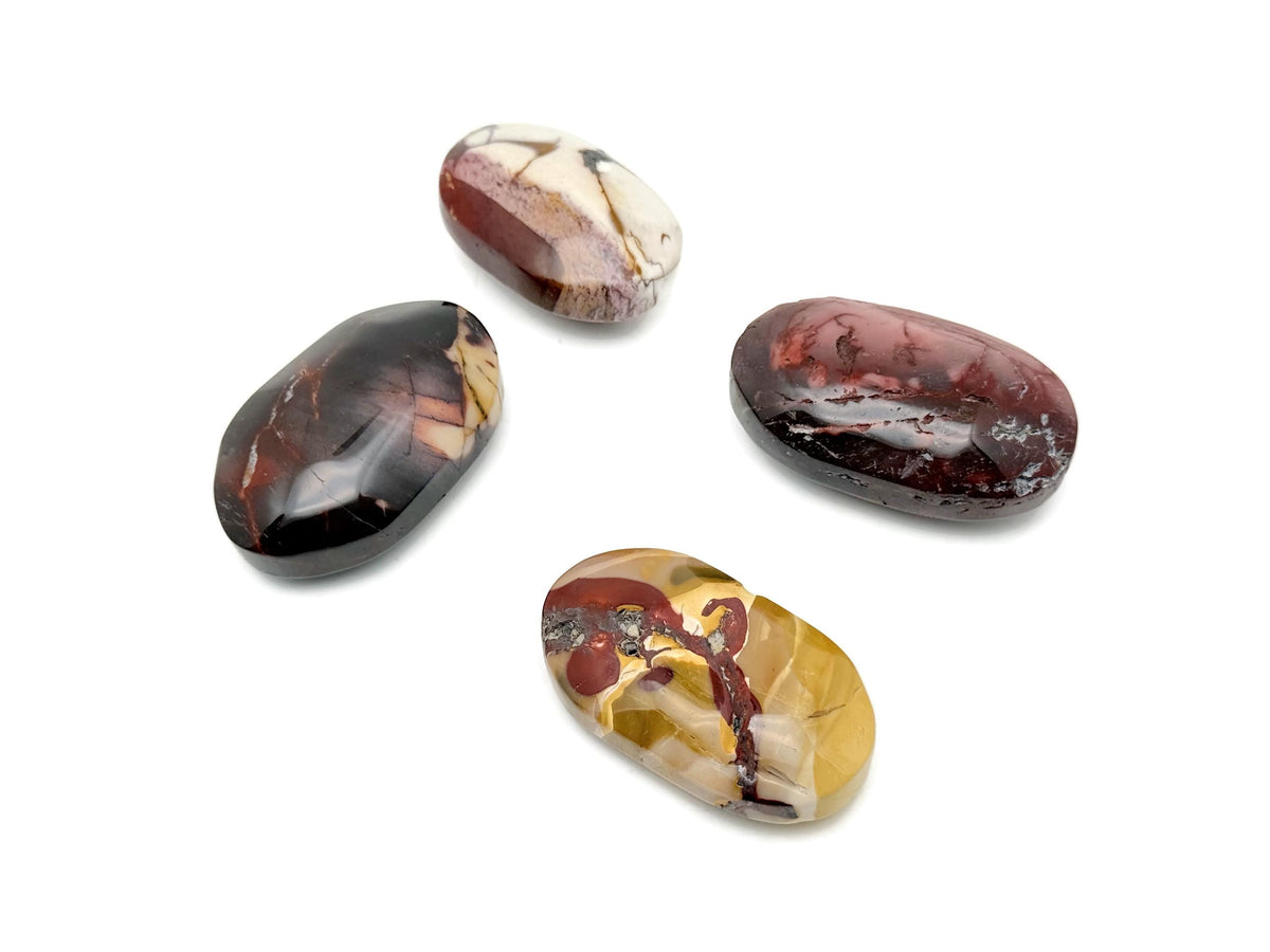 Mookaite Jasper palm gemstone spa stone from GemstoneGO, polished natural red and yellow Jasper stone for relaxation or meditation.