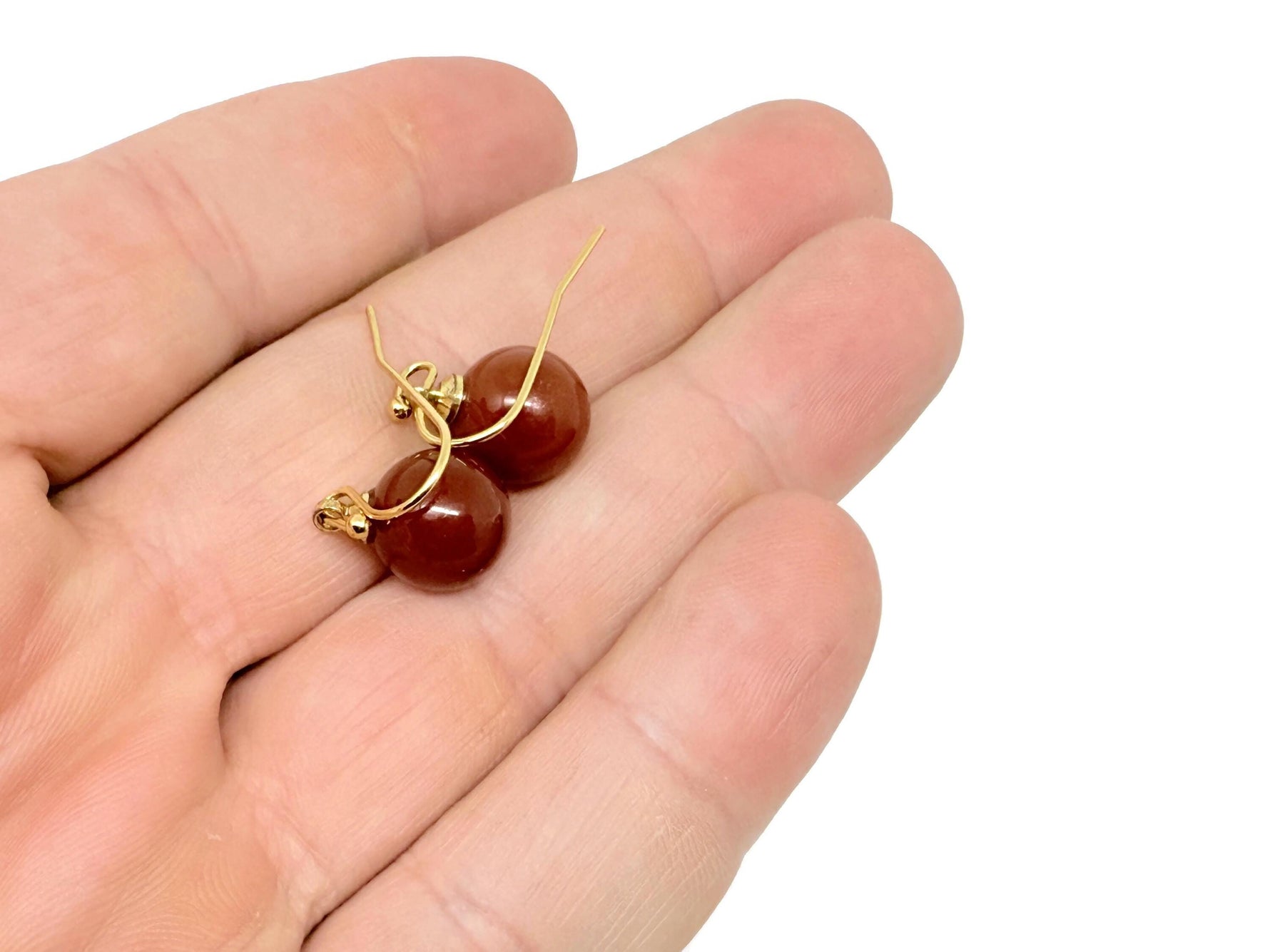 Gold gemstone ball crystal earrings from GemstoneGO featuring spherical crystal design and mixed gemstone accents.