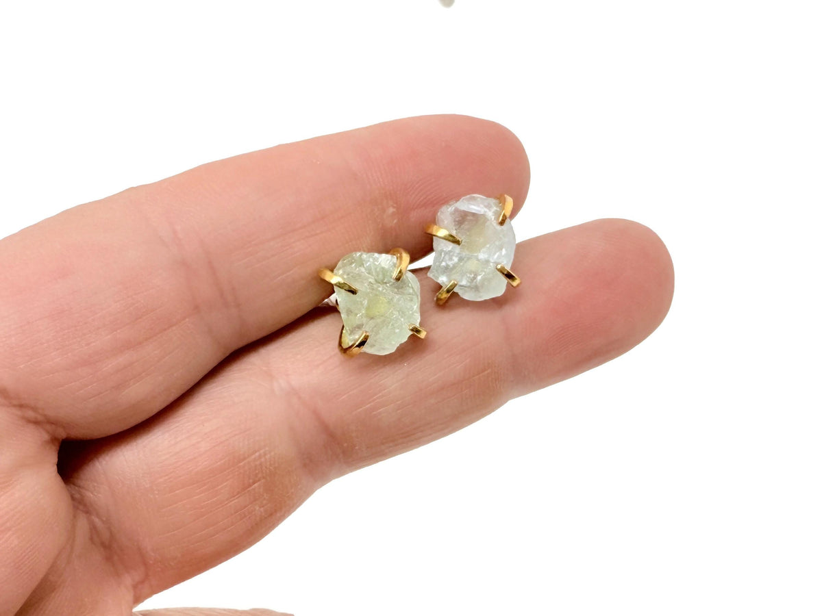 Rough crystal stud earrings with gold detailing from GemstoneGO, minimalist style, featuring natural crystal textures and gold accents.