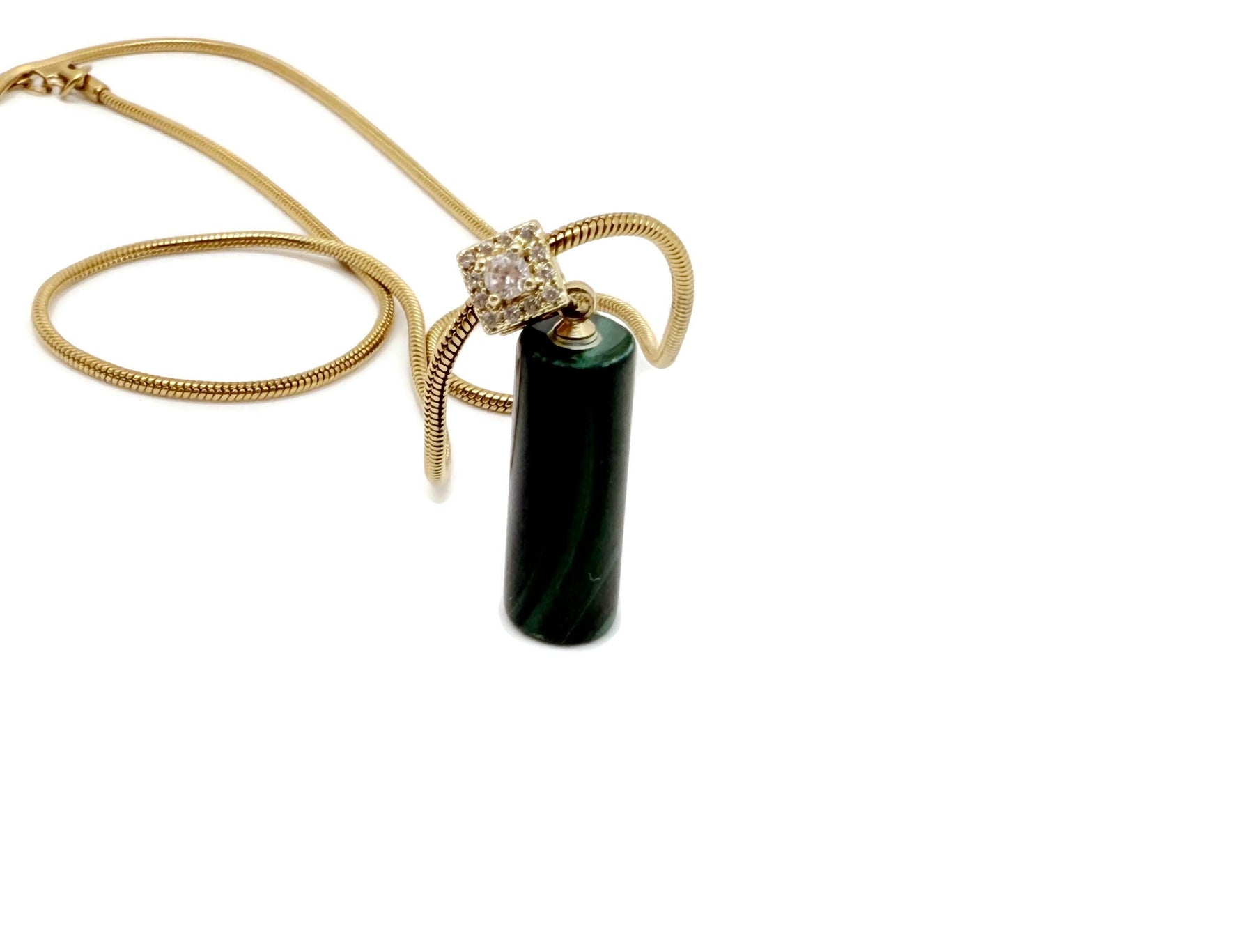 Malachite cylinder crystal necklace with gold chain, designed for protection and power, by GemstoneGO.