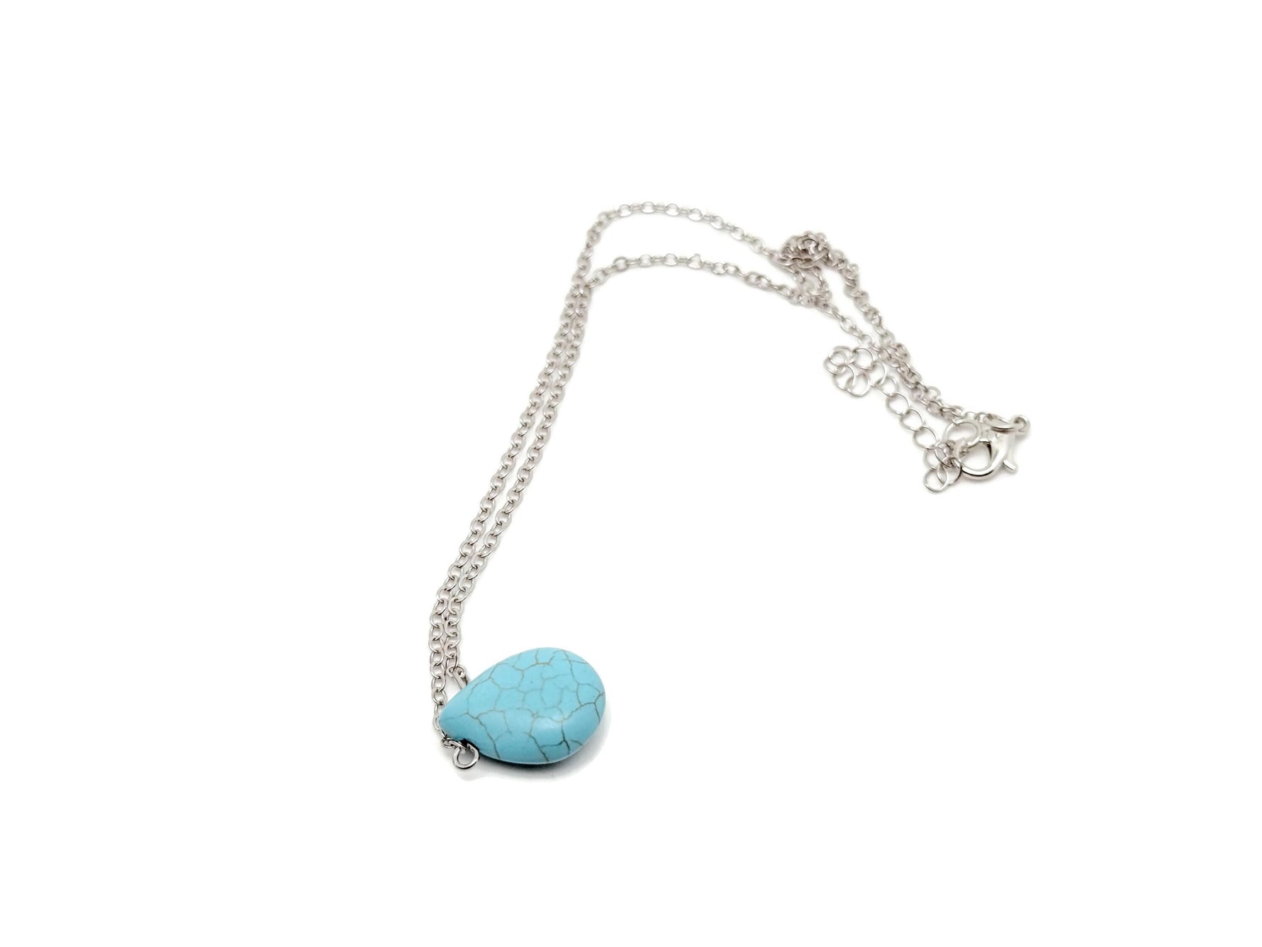Turquoise synthetic necklace from GemstoneGO featuring beads for protection and balance.