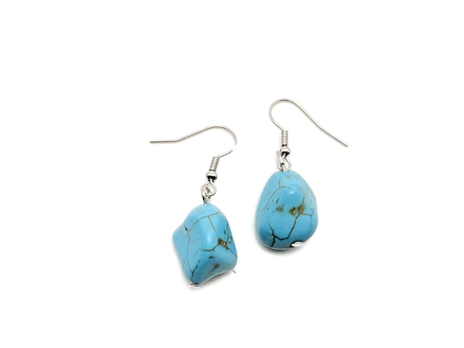 Turquoise jewelry set with crystal accents from GemstoneGO, featuring matching necklace and earrings on a neutral background.