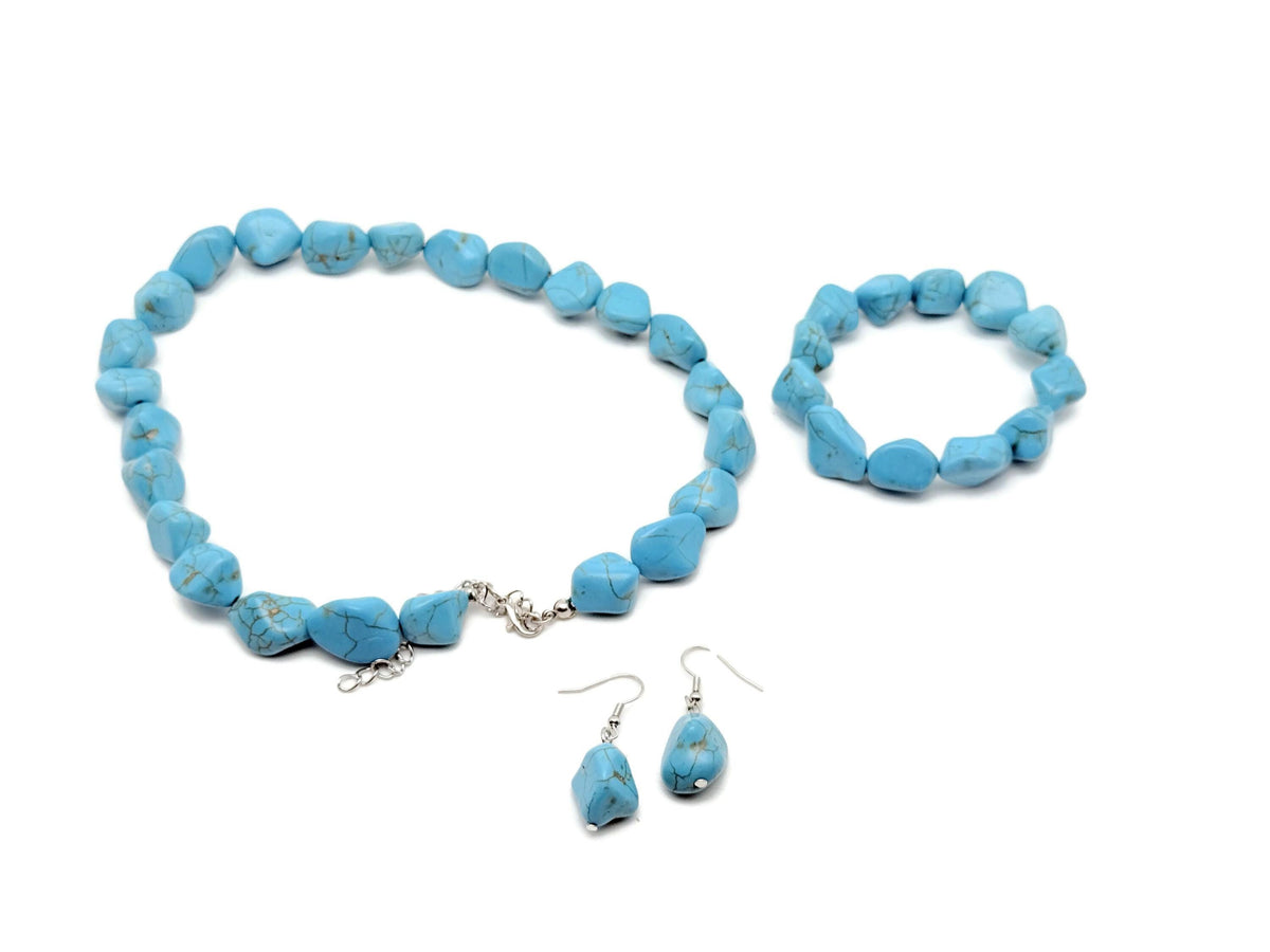 Turquoise jewelry set with matching necklace and earrings featuring crystal accents, by GemstoneGO.