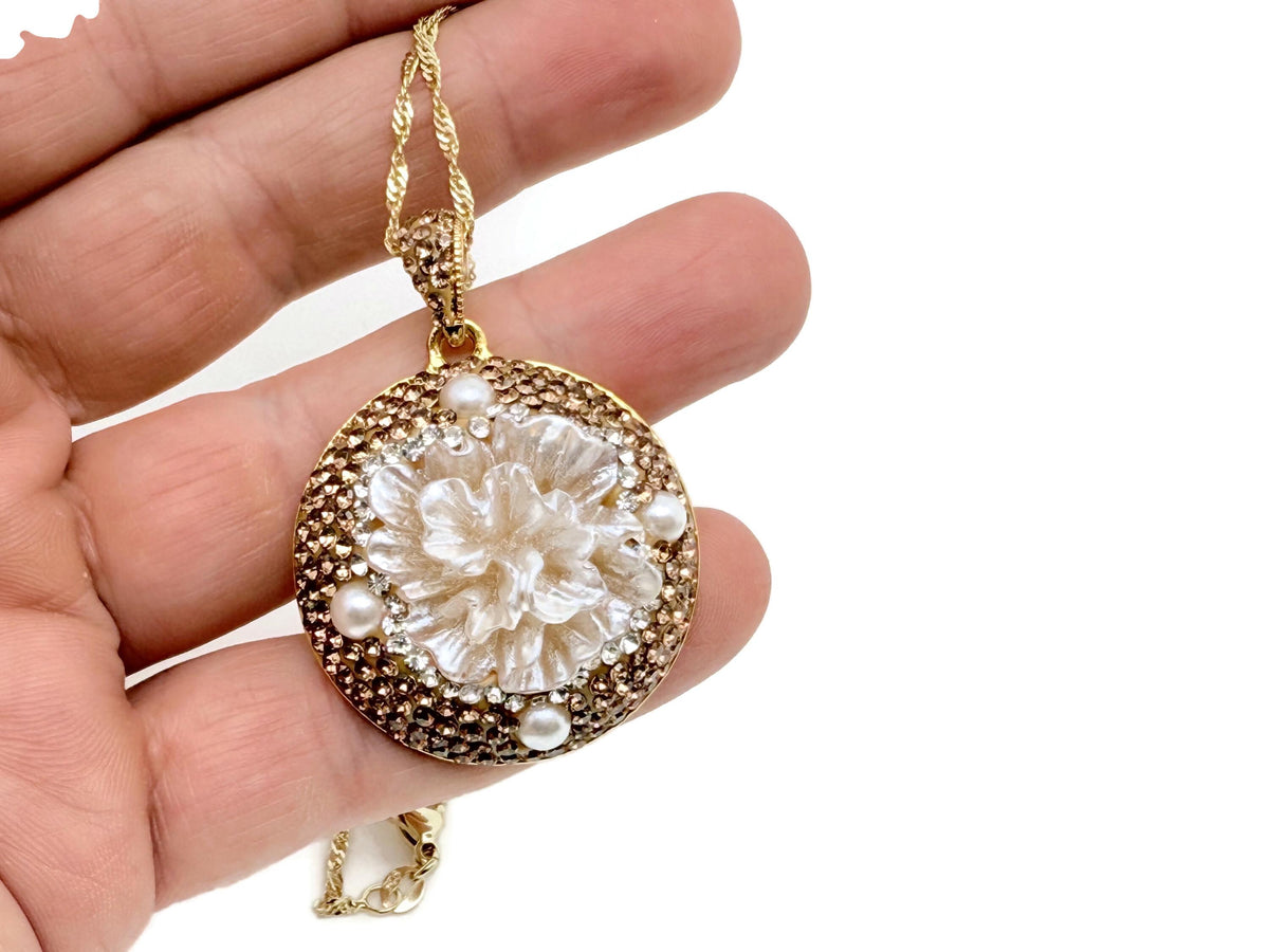 Pearl and crystal flower jewelry set by GemstoneGO featuring earrings and necklace with elegant floral design.