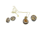 Citrine crystal jewelry set with earrings and necklace from GemstoneGO, featuring polished yellow-orange citrine stones.