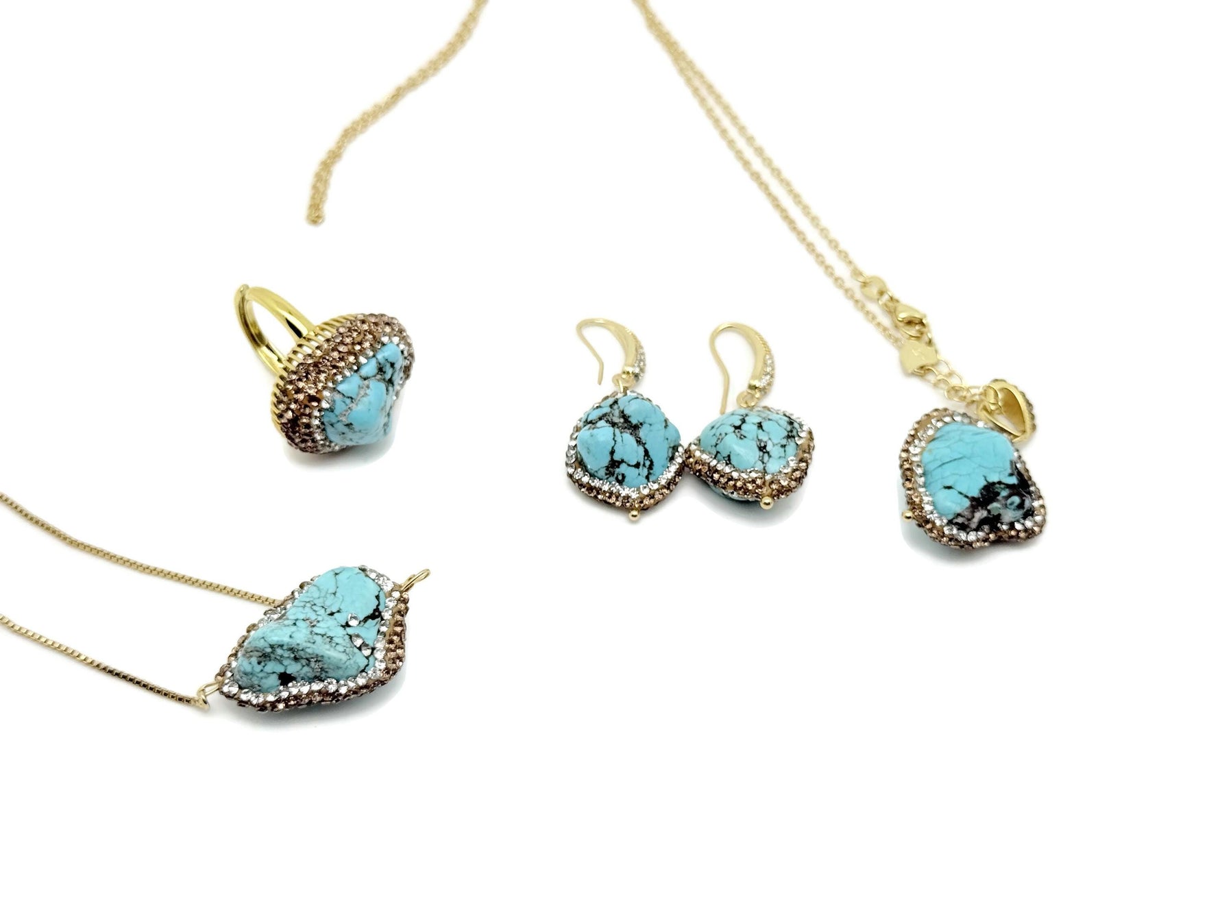Turquoise jewelry set with crystal accents from GemstoneGO, featuring necklace, earrings, and bracelet on a neutral background.