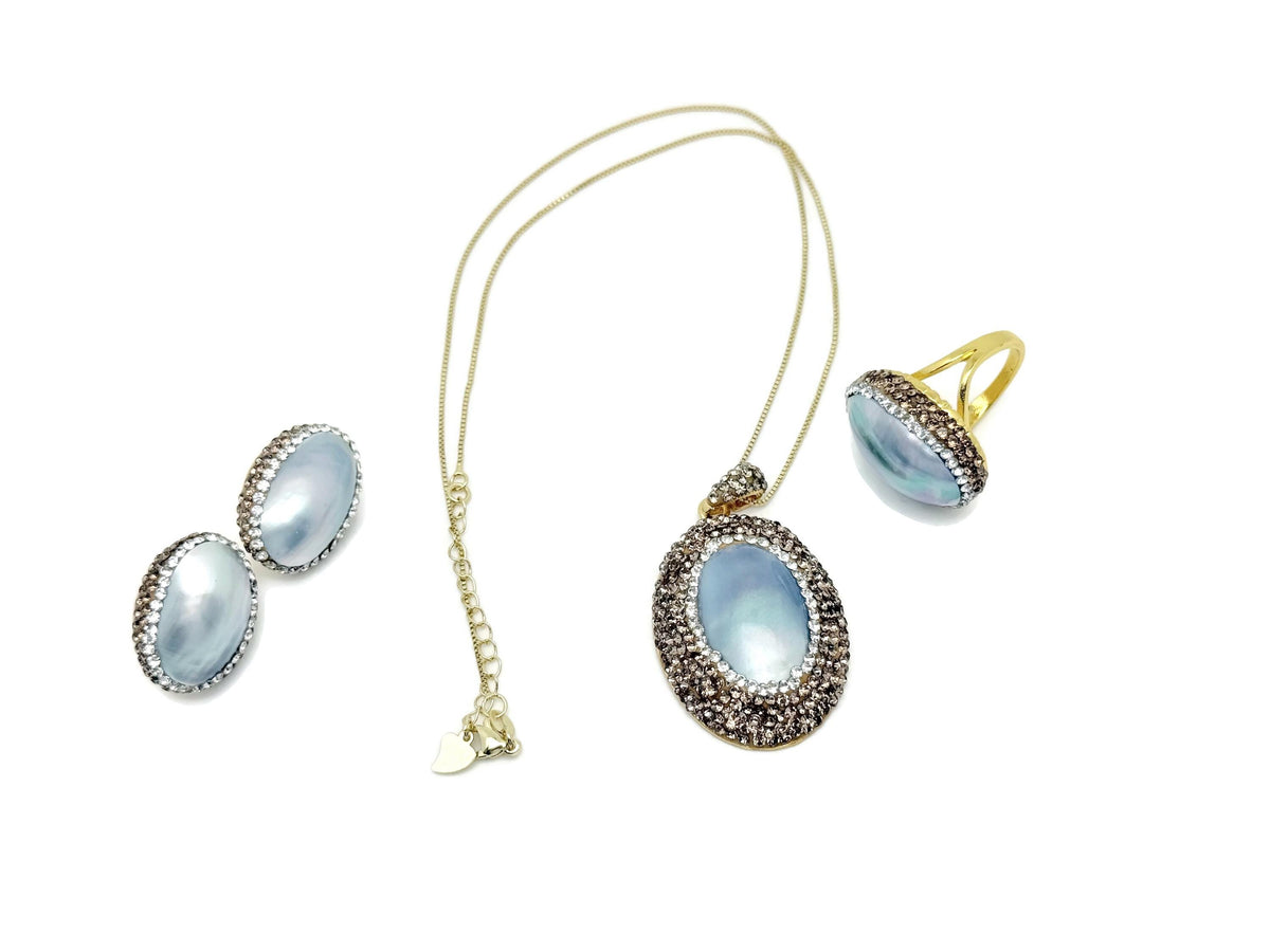 Elegant blue pearl jewelry set by GemstoneGO featuring matching necklace and earrings for bridal or evening wear.