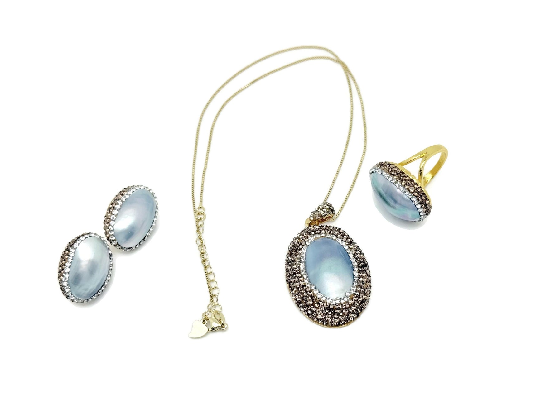 Elegant blue pearl jewelry set by GemstoneGO featuring matching necklace and earrings for bridal or evening wear.
