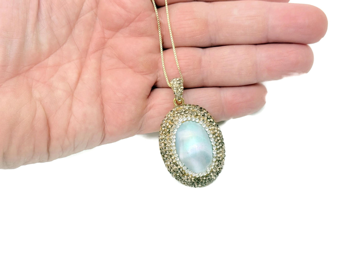 Elegant blue pearl jewelry set by GemstoneGO featuring matching necklace and earrings for bridal or evening wear.