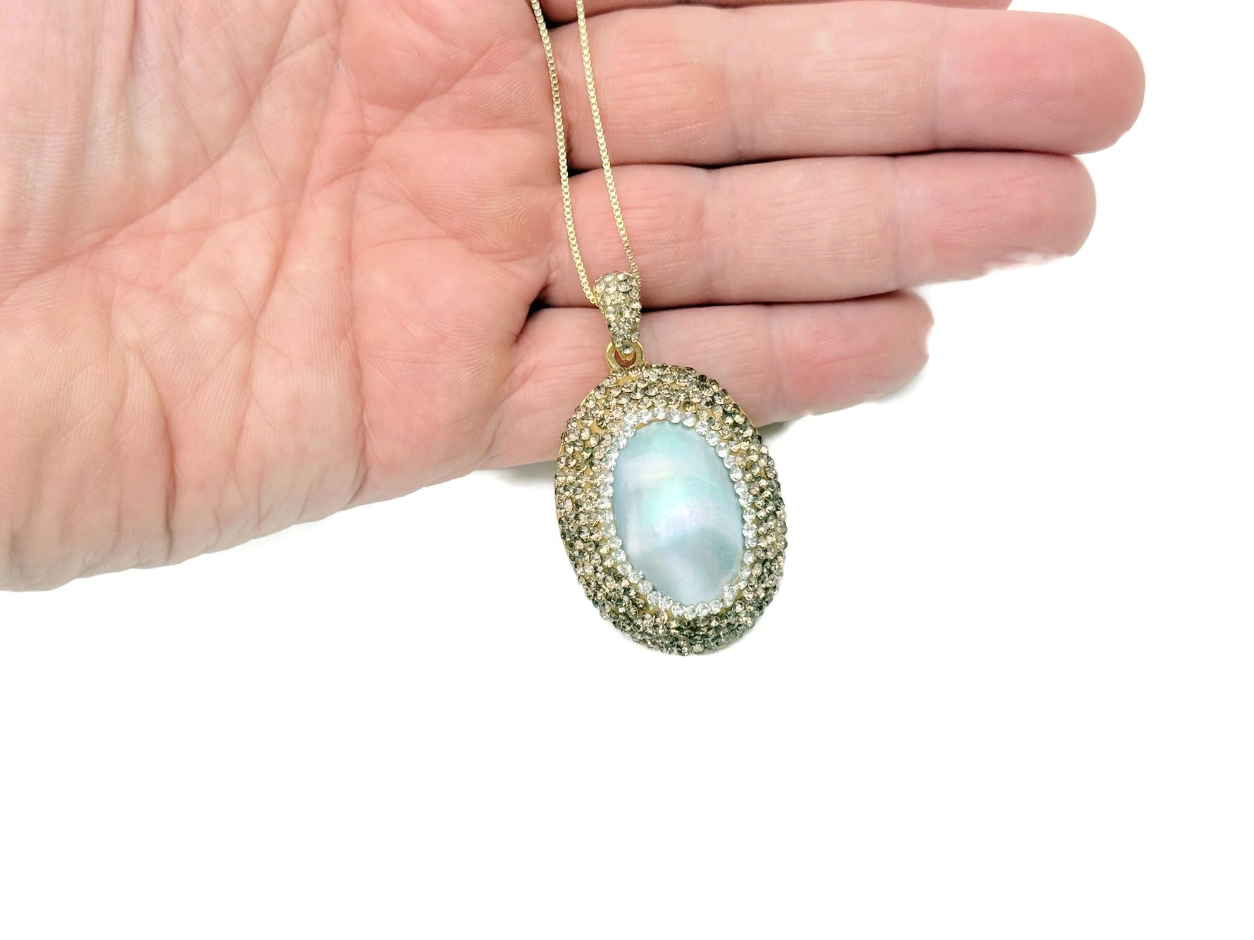 Elegant blue pearl jewelry set by GemstoneGO featuring matching necklace and earrings for bridal or evening wear.