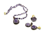 Handmade boho chic amethyst jewelry set with earrings and necklace from GemstoneGO, featuring polished purple gemstones and silver accents.