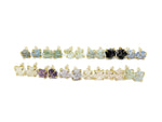 Rough crystal stud earrings with gold detailing from GemstoneGO, minimalist jewelry with natural gemstone textures.