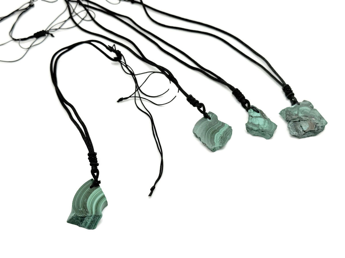 Malachite crystal necklace with an adjustable cord from GemstoneGO, showcasing a vibrant green polished gemstone pendant.