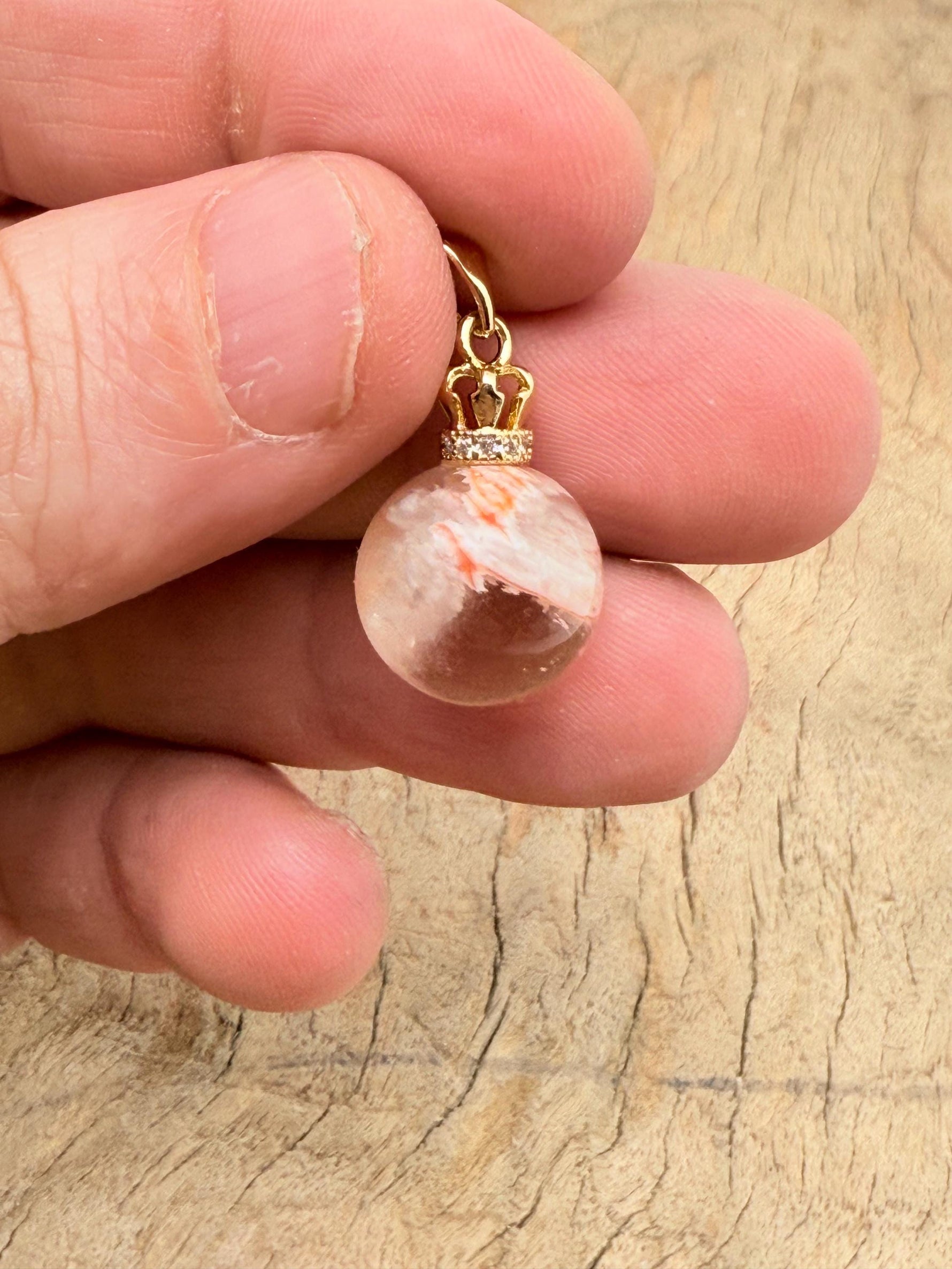 Ghost Quartz pendant from GemstoneGO featuring a Phantom Crystal for spiritual growth and healing, shown on a chain.