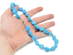 Turquoise jewelry set with crystal accents from GemstoneGO, featuring matching necklace and earrings on a white background.
