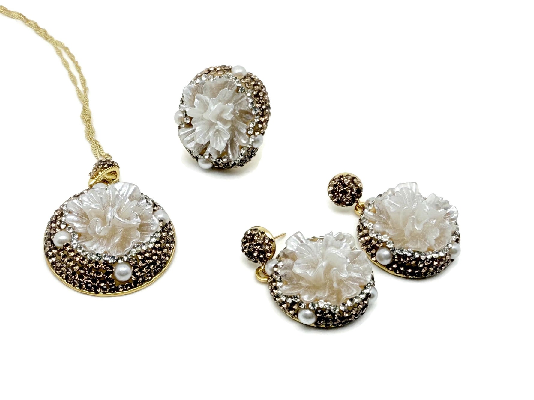 Pearl flower jewelry set by GemstoneGO featuring crystal accents, including matching necklace and earrings.