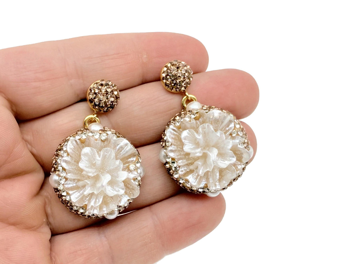 Pearl and crystal flower jewelry set by GemstoneGO with earrings and necklace, elegant floral design for special occasions.