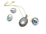 Elegant blue pearl jewelry set by GemstoneGO, featuring a necklace and earrings for bridal or evening wear.