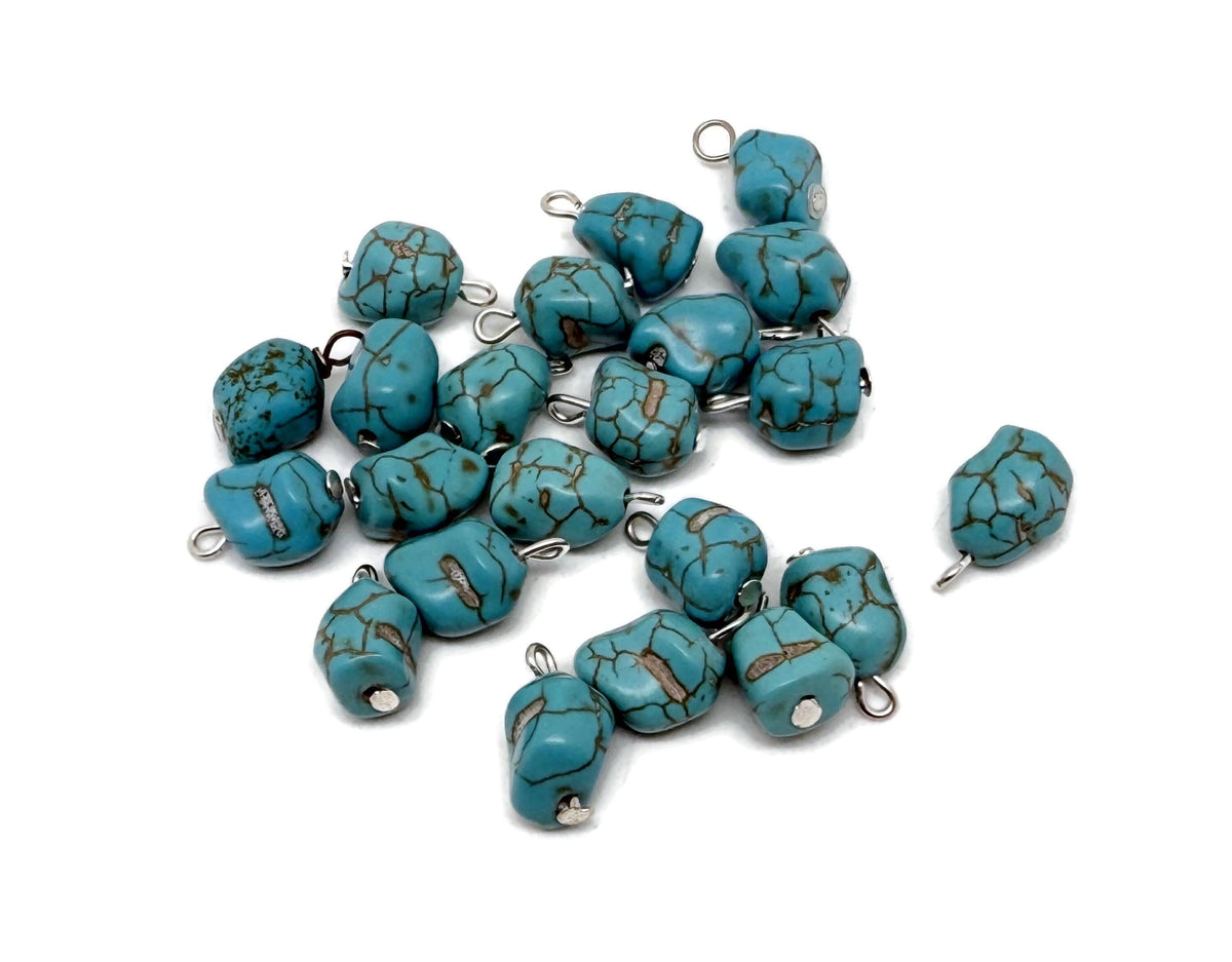 Turquoise crystal pendant with blue stones from GemstoneGO, showcasing a vibrant, polished gemstone necklace.