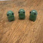 Handcrafted aventurine frog monster crystal carving with detailed gemstone features, gemstone sculpture, and vibrant green hues.
