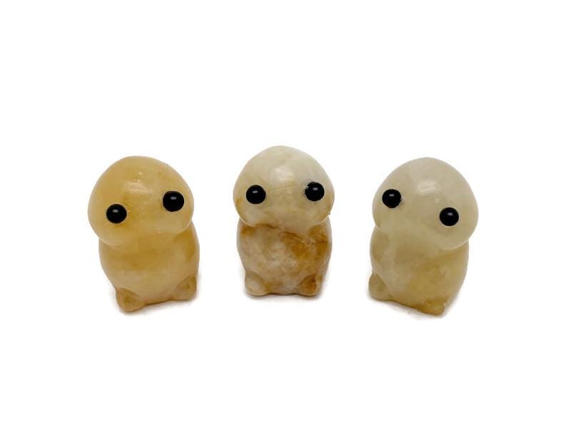 Yellow jade frog monster carving from GemstoneGO featuring a handcrafted gemstone creature statue with intricate details.