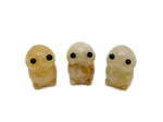 Yellow jade frog monster carving from GemstoneGO featuring a handcrafted gemstone creature statue with intricate details.