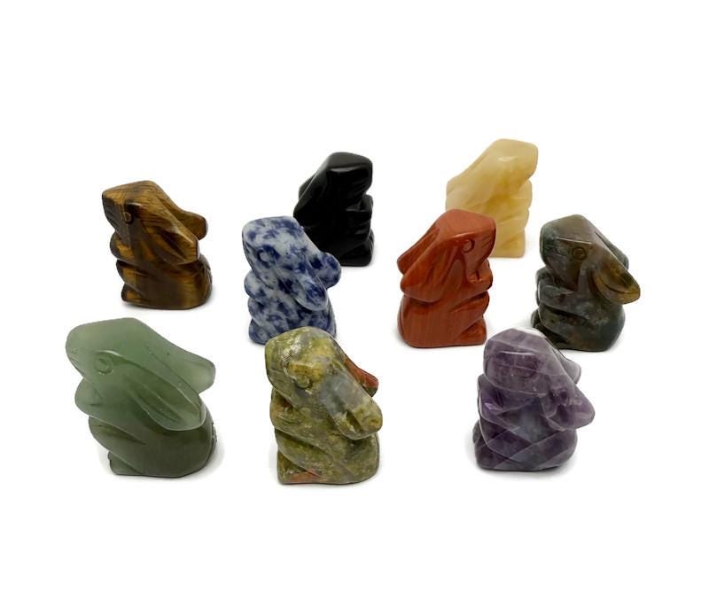 Handmade 30mm gemstone crystal rabbit animal figure by GemstoneGO, carved and colorful, detailed natural stone craftsmanship.