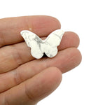 Handmade 30mm crystal butterfly beads with animal figure carvings by GemstoneGO, featuring drilled holes for jewelry making.
