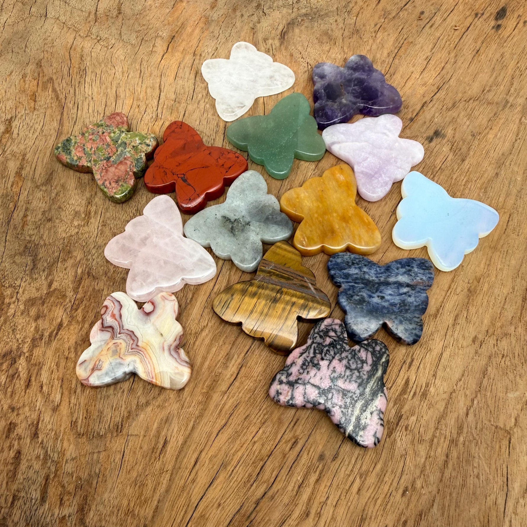 Handmade 35mm gemstone crystal butterfly animal figure with carved details, vibrant mix of colors from GemstoneGO.