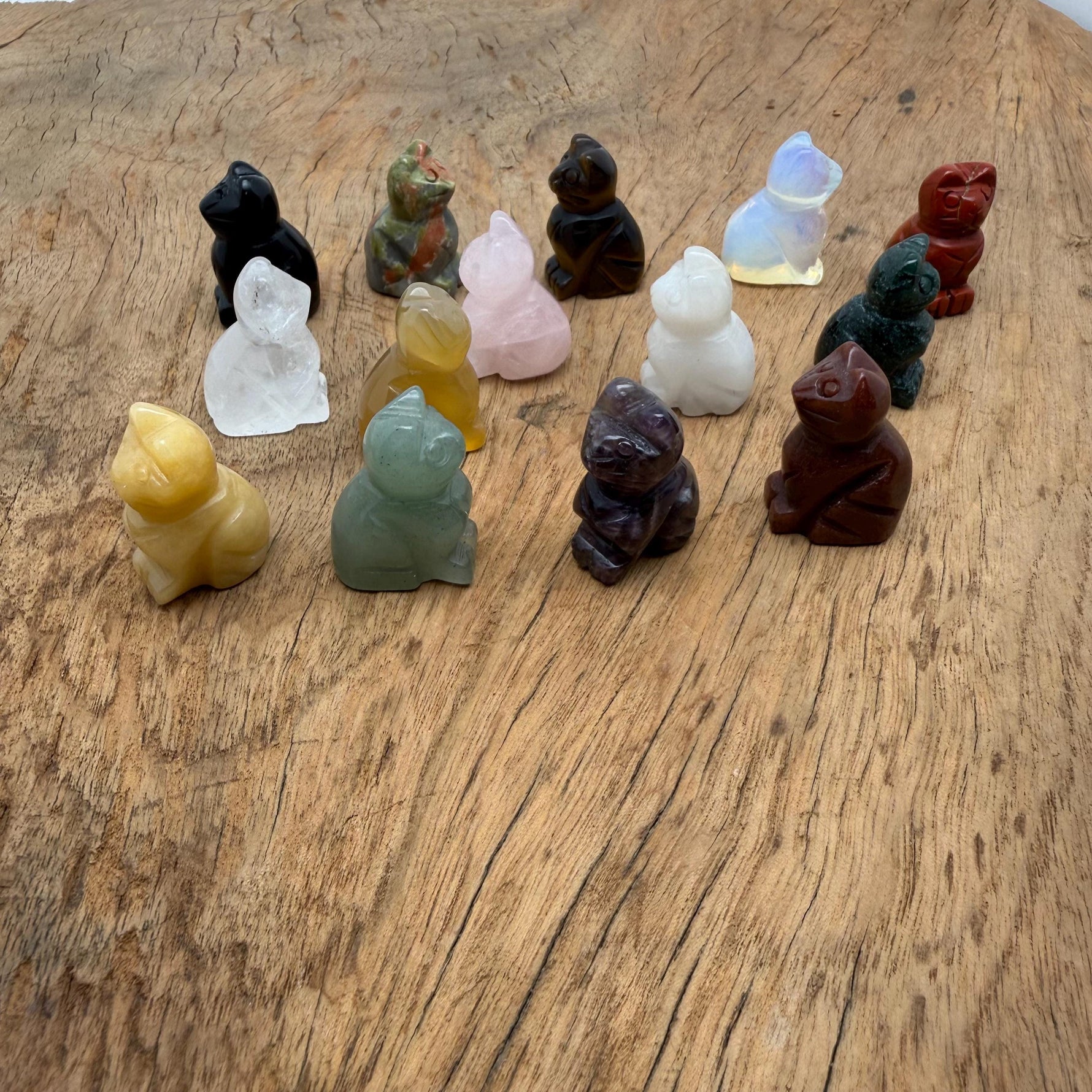 Handmade carved crystal cat animal figure by GemstoneGO, 30mm, featuring a colorful mixed gemstone design.