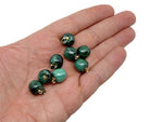 Malachite apple-shaped crystal pendant from GemstoneGO, featuring vibrant green semi-precious gemstone jewelry.