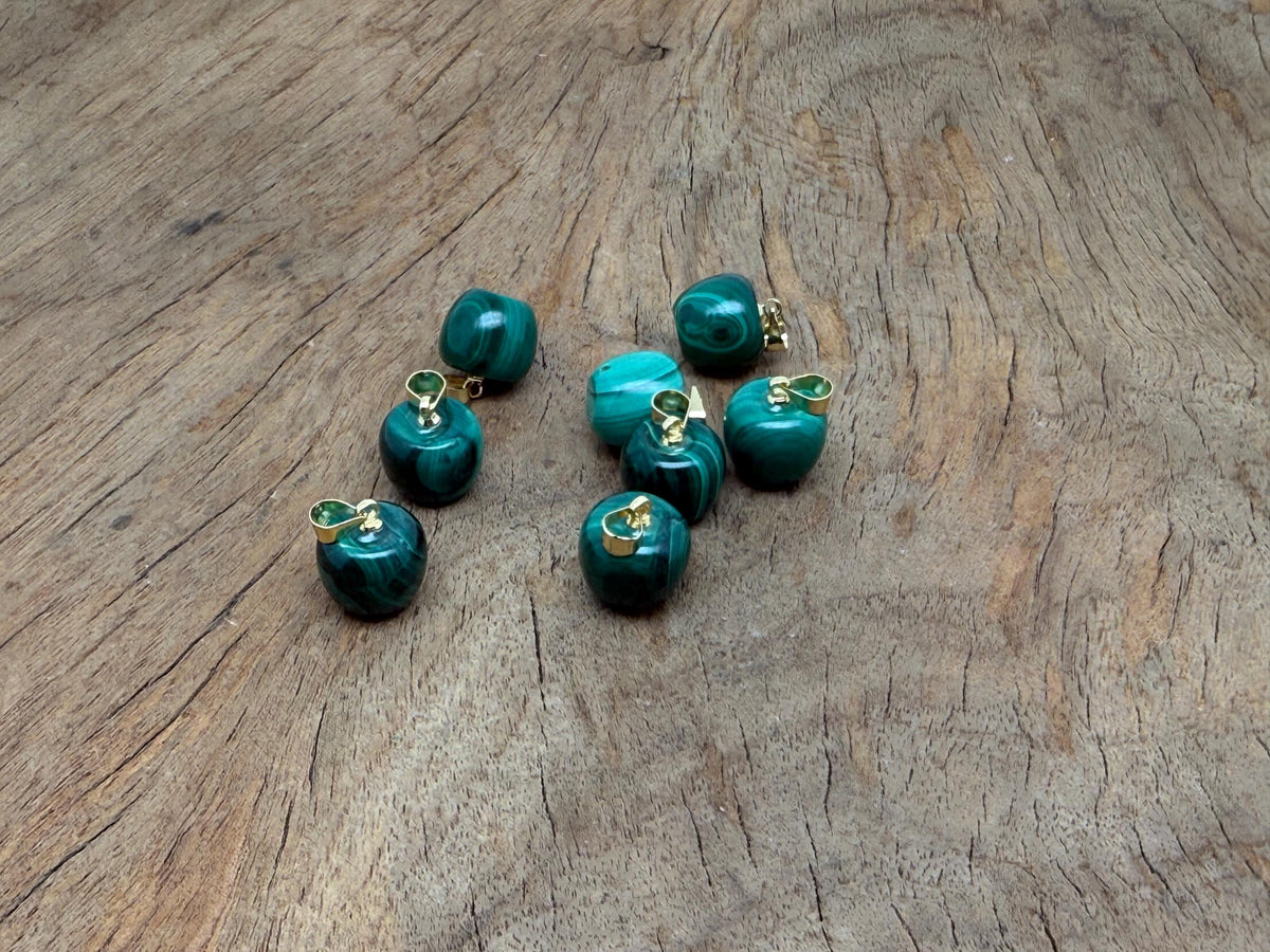 Malachite and apple-shaped crystal pendant from GemstoneGO featuring semi-precious jewelry with vibrant green stone and silver setting.